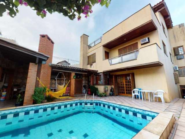 Casa com 4 quartos à venda na Rua Pinto da Rocha, 383, Partenon, Porto Alegre, 420 m2 por R$ 890.000