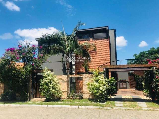 Casa em condomínio fechado com 3 quartos à venda na Rua Manoel Pedro Vieira, 8745, Morro das Pedras, Florianópolis, 420 m2 por R$ 3.999.000