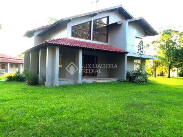 Casa em condomínio fechado com 4 quartos à venda na Rua Regência, 415, Sítio Ipiranga, Cachoeirinha, 550 m2 por R$ 1.400.000