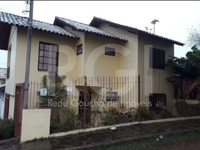 Casa com 3 quartos à venda na Rua Panambi, Cavalhada, Porto Alegre, 149 m2 por R$ 549.900