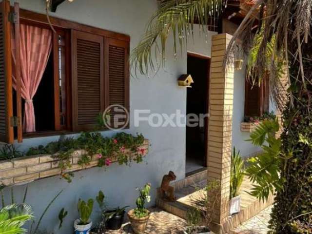 Casa com 3 quartos à venda na Rua das Adálias, 372, Cecília, Viamão, 180 m2 por R$ 430.000