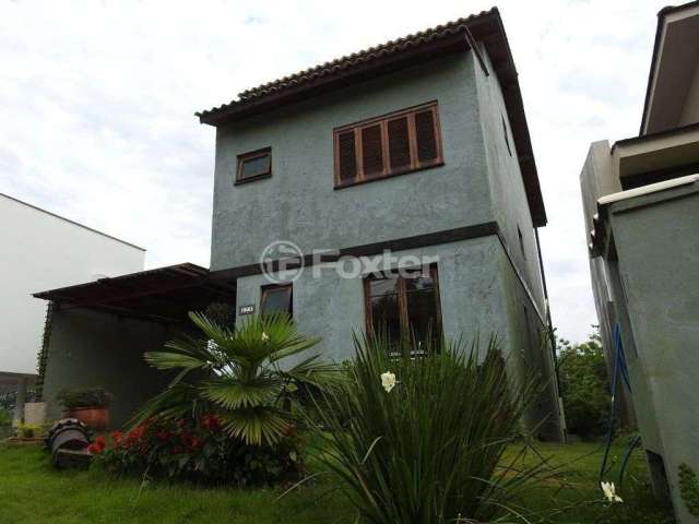 Casa em condomínio fechado com 3 quartos à venda na Avenida Senador Salgado Filho, 8500, Vila Augusta, Viamão, 238 m2 por R$ 900.000