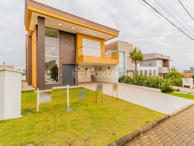 Casa em condomínio fechado com 3 quartos à venda na Avenida Senador Salgado Filho, 8500, Querência, Viamão, 221 m2 por R$ 1.650.000
