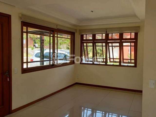 Casa em condomínio fechado com 4 quartos à venda na Rua dos Cardeais, 187, Tarumã, Viamão, 177 m2 por R$ 890.000