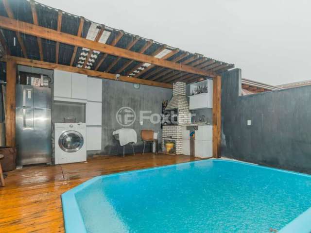 Casa com 2 quartos à venda na Rua Coronel Dastro Dutra, 595, Restinga, Porto Alegre, 52 m2 por R$ 269.000