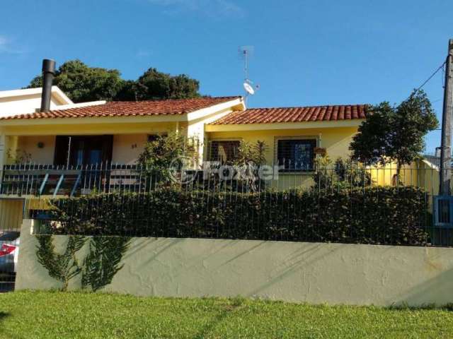Casa com 3 quartos à venda na Rua Érico Veríssimo, 88, Tarumã, Viamão, 163 m2 por R$ 600.000