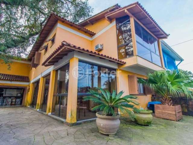 Casa com 4 quartos à venda na Rua Palermo, 105, Santa Isabel, Viamão, 360 m2 por R$ 760.000