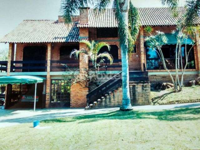 Casa com 5 quartos à venda na Rua Telmo Godoy Pinto, 510, Centro, Viamão, 600 m2 por R$ 1.850.000