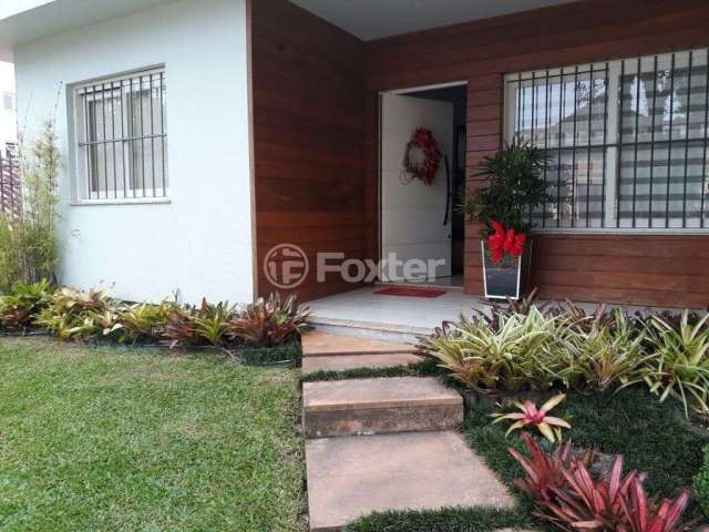 Casa com 4 quartos à venda na Rua Dezessete de Junho, 2126, Morro do Leôncio, Taquara, 158 m2 por R$ 1.099.000