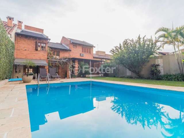 Casa com 4 quartos à venda na Rua Dona Adda Mascarenhas de Moraes, 910, Jardim Itu Sabará, Porto Alegre, 422 m2 por R$ 1.350.750