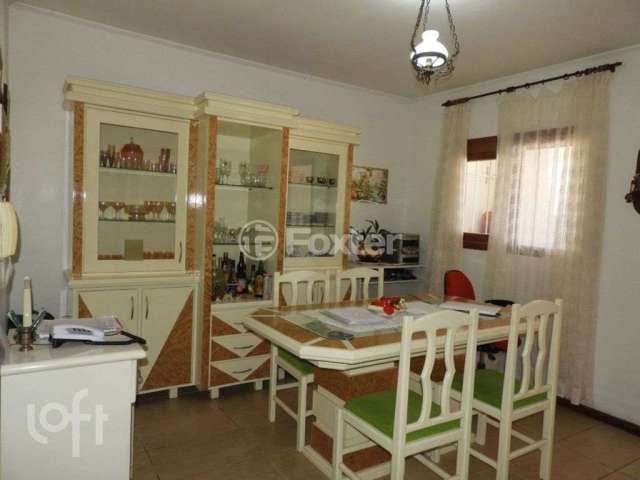 Casa com 3 quartos à venda na Rua Márcio Dias, 176, Nonoai, Porto Alegre, 318 m2 por R$ 850.000