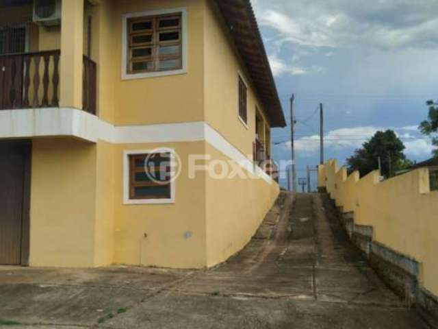 Casa com 3 quartos à venda na Rua Rufino Pereira, 196, Centro, Arroio dos Ratos, 212 m2 por R$ 675.000