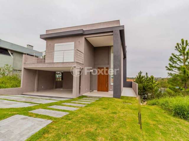 Casa em condomínio fechado com 3 quartos à venda na Avenida Senador Salgado Filho, 8500, Vila Augusta, Viamão, 287 m2 por R$ 1.650.000