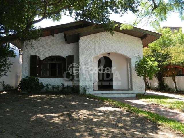 Casa com 3 quartos à venda na Avenida Guaíba, 10652, Ipanema, Porto Alegre, 230 m2 por R$ 750.000