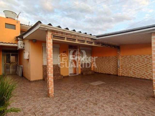 Casa com 3 quartos à venda na Rua Fabrício Valandro Roxo, 398, Jardim Algarve, Alvorada, 98 m2 por R$ 299.000