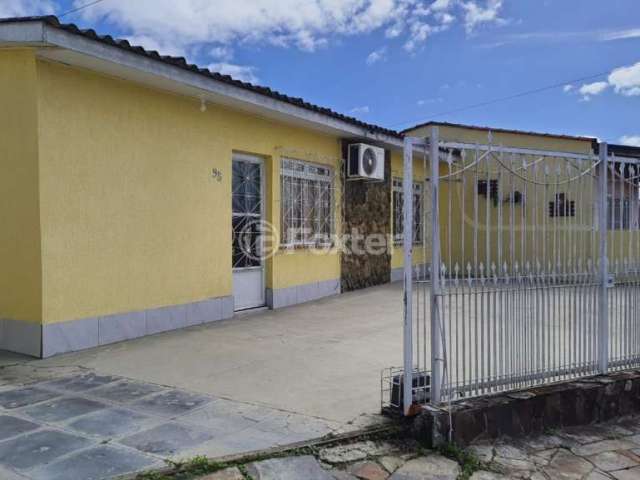 Casa com 6 quartos à venda na Avenida Antônio Batista, 98, Parque Índio Jari, Viamão, 184 m2 por R$ 450.000