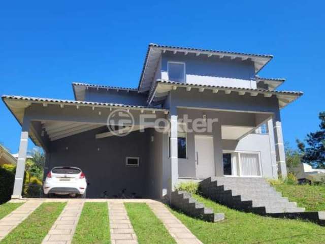 Casa em condomínio fechado com 3 quartos à venda na Estrada Capitão Gentil Machado de Godoy, 4500, Vila Elsa, Viamão, 720 m2 por R$ 1.377.500
