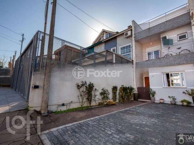 Casa com 2 quartos à venda na Rua Silvino Nedel, 110, Mário Quintana, Porto Alegre, 170 m2 por R$ 590.000
