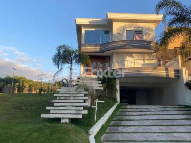 Casa em condomínio fechado com 4 quartos à venda na Avenida Senador Salgado Filho, 8500, Vila Augusta, Viamão, 534 m2 por R$ 3.250.000