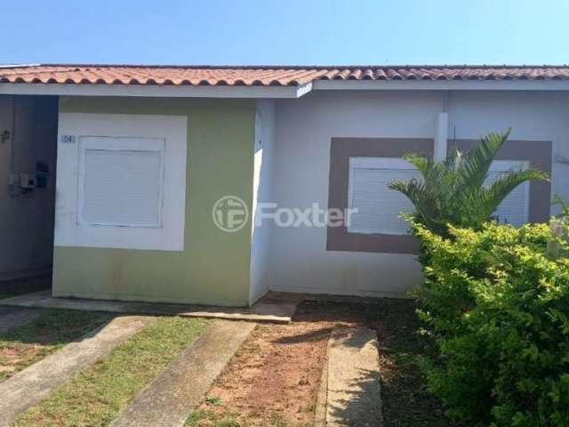 Casa em condomínio fechado com 2 quartos à venda na Rua Terra Nova, 502, Jardim Algarve, Alvorada, 45 m2 por R$ 250.000