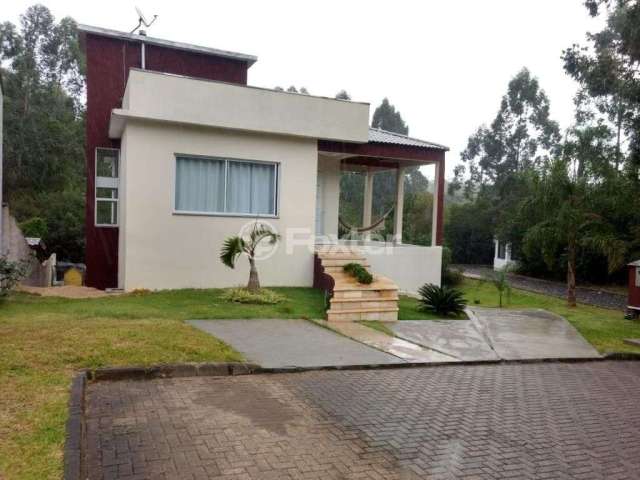 Casa em condomínio fechado com 3 quartos à venda na Rua das Andorinhas, 718, Tarumã, Viamão, 240 m2 por R$ 790.000