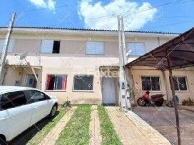 Casa em condomínio fechado com 2 quartos à venda na Avenida Jorge Amado, 741, Santa Cruz, Gravataí, 61 m2 por R$ 169.000