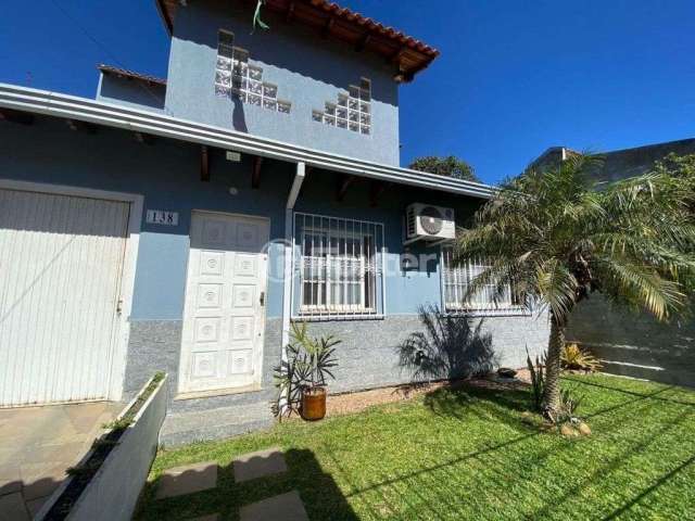Casa com 3 quartos à venda na Rua Perudia, 138, Santa Isabel, Viamão, 177 m2 por R$ 400.000
