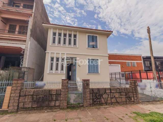 Casa comercial com 3 salas à venda na Rua Conselheiro Travassos, 206, São Geraldo, Porto Alegre, 440 m2 por R$ 1.100.000