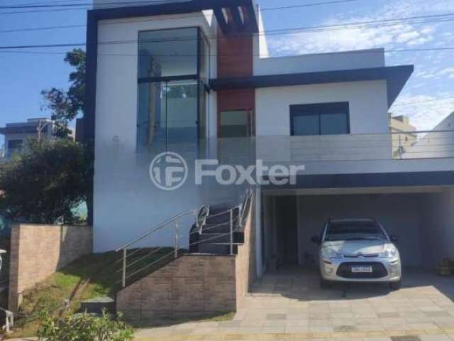 Casa em condomínio fechado com 3 quartos à venda na Rua Lino Estácio dos Santos, 1001, Oriço, Gravataí, 142 m2 por R$ 1.090.000