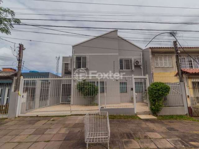Casa com 3 quartos à venda na Rua Márcio Dias, 480, Nonoai, Porto Alegre, 230 m2 por R$ 1.450.000
