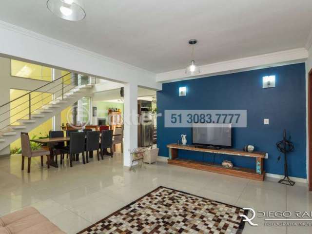 Casa em condomínio fechado com 4 quartos à venda na Rua Cangerana, 210, São Lucas, Viamão, 332 m2 por R$ 1.100.000