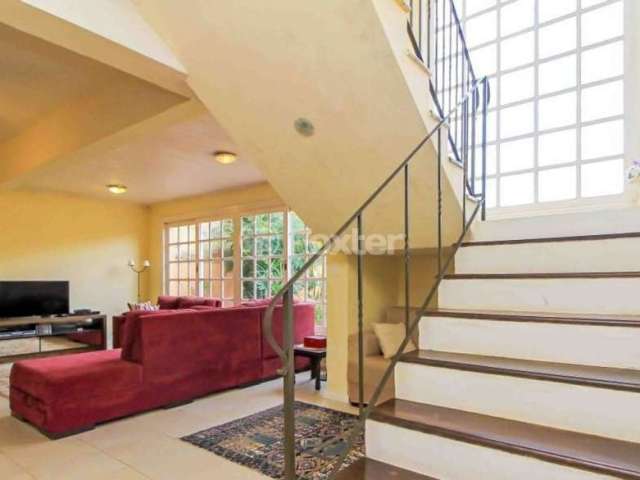Casa com 3 quartos à venda na Rua Engenheiro Jorge Porto, 263, Ipanema, Porto Alegre, 312 m2 por R$ 765.000
