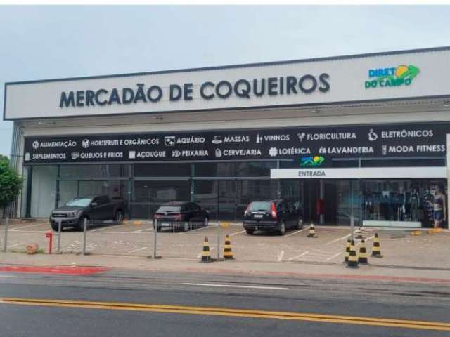 Aluga-se loja térrea com 400 metros  na avenida principal em Coqueiros