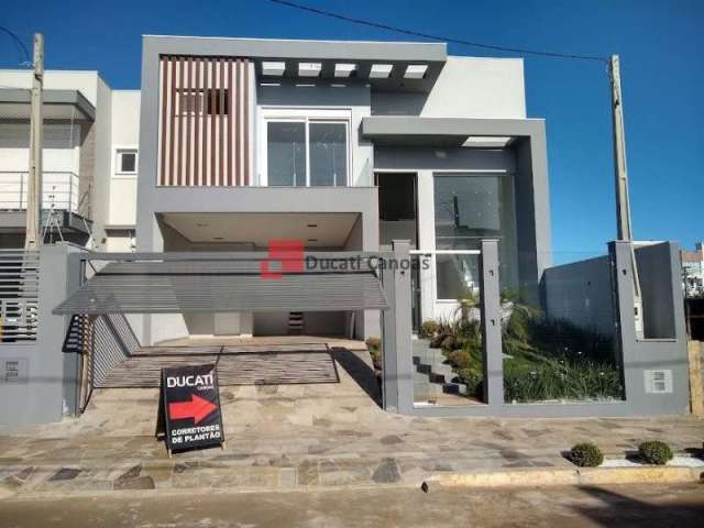 Casa com 3 quartos à venda na Rua Henrique Kranen Filho, Moinhos De Vento, Canoas, 215 m2 por R$ 1.360.000
