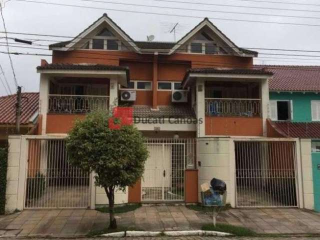 Casa com 3 quartos à venda na Avenida Inconfidência, Marechal Rondon, Canoas, 294 m2 por R$ 1.190.000