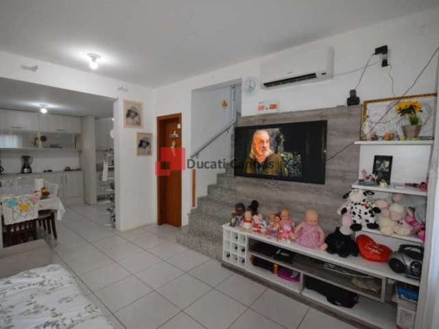 Casa em condomínio fechado com 2 quartos à venda na Rua Capistrano de Abreu, Niterói, Canoas, 150 m2 por R$ 410.000