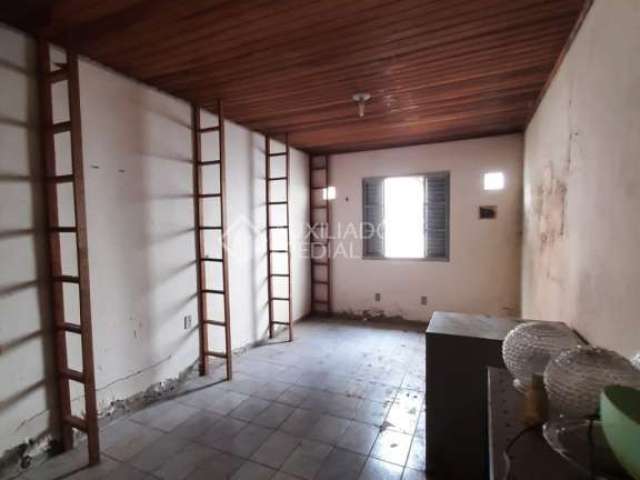 Casa com 4 quartos à venda na Avenida Felipe Weimann, 98, Santa Tereza, Porto Alegre, 180 m2 por R$ 320.000