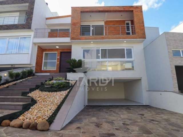 Casa em condomínio fechado com 3 quartos à venda na Rua Francisco Solano Borges, 200, Hípica, Porto Alegre por R$ 1.390.000