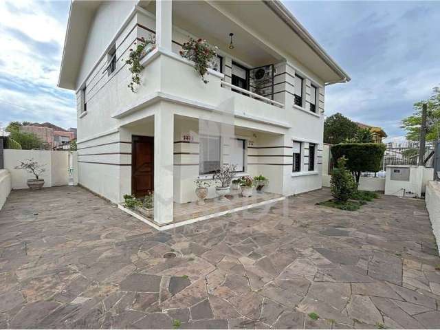 Casa com 4 quartos à venda na Rua Evaristo da Veiga, 226, Partenon, Porto Alegre por R$ 1.150.000