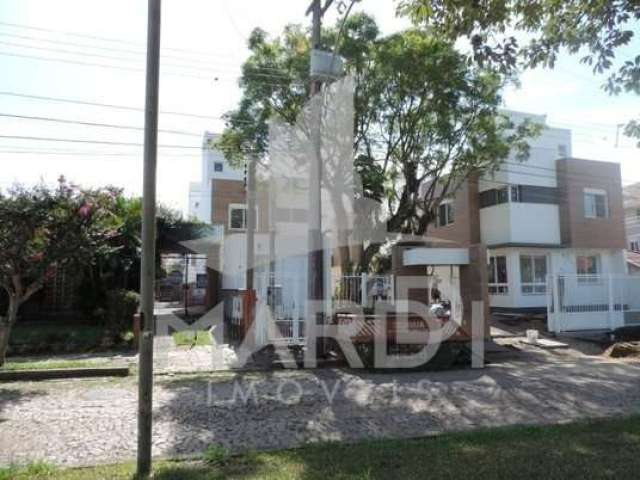 Casa em condomínio fechado com 3 quartos à venda na Rua Paraguá, 54, Vila Assunção, Porto Alegre por R$ 1.250.000