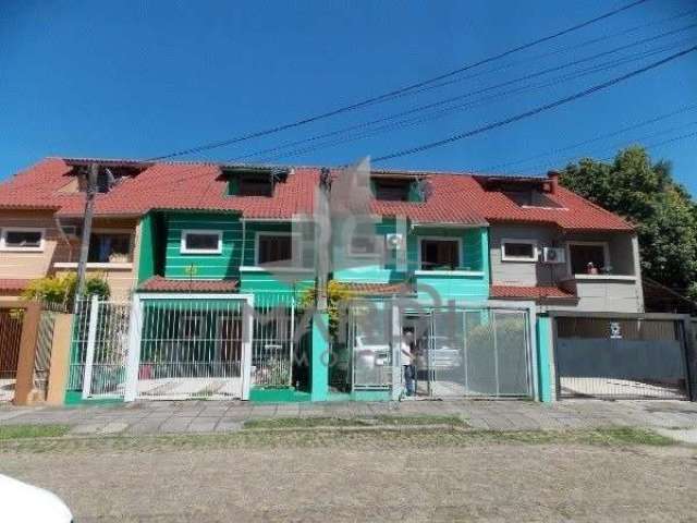 Casa com 4 quartos à venda na Rua dos Guenoas, 897, Guarujá, Porto Alegre por R$ 420.000