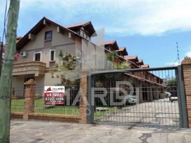 Casa em condomínio fechado com 3 quartos à venda na Rua Doutor Possidônio Cunha, 273, Vila Assunção, Porto Alegre por R$ 720.000