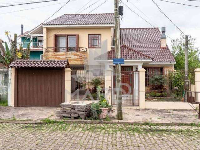 Casa com 3 quartos à venda na Avenida Guaíba, 13914, Ipanema, Porto Alegre por R$ 990.000