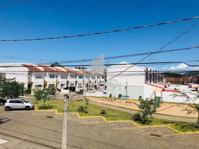 Casa em condomínio fechado com 3 quartos à venda na Avenida Edgar Pires de Castro, 2520, Hípica, Porto Alegre por R$ 330.000