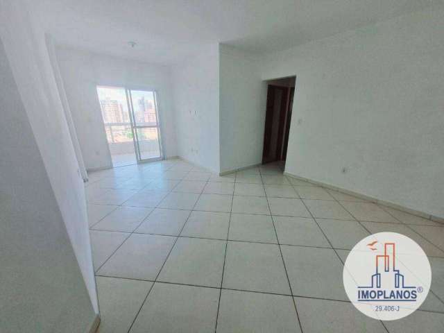 Apartamento com 2 dormitórios para alugar, 60 m² por R$ 2.700,02/mês - Tupi - Praia Grande/SP
