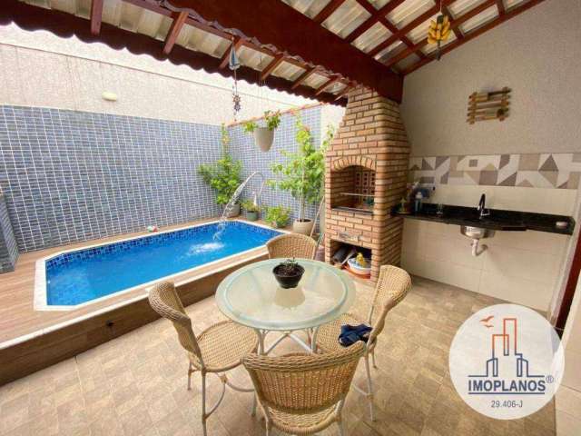 Sobrado com 3 dormitórios à venda, 118 m² por R$ 750.000,00 - Maracanã - Praia Grande/SP