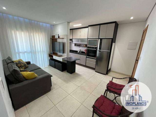 Apartamento com 2 dormitórios à venda, 55 m² por R$ 390.000,00 - Vila Guilhermina - Praia Grande/SP