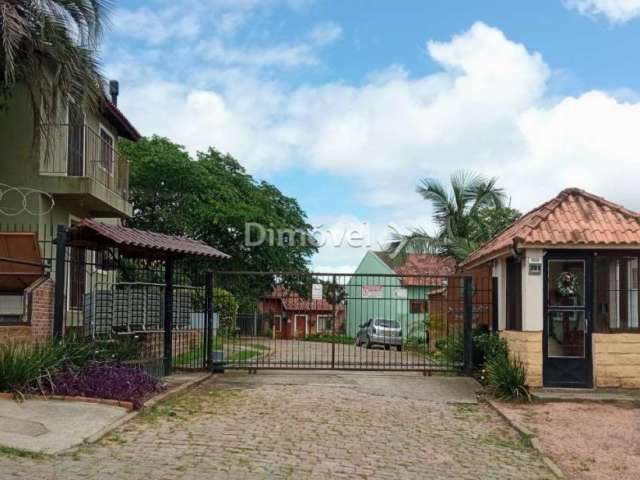 Casa em condomínio fechado com 4 quartos à venda na Rua João do Couto, 201, Belém Velho, Porto Alegre por R$ 630.000