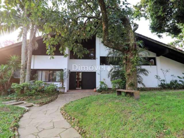Casa com 4 quartos à venda na Rua Padre João Batista Reus, 180, Vila Conceição, Porto Alegre por R$ 2.800.000