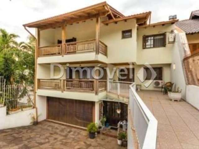 Casa com 4 quartos à venda na Rua Caeté, 600, Vila Assunção, Porto Alegre por R$ 1.590.000
